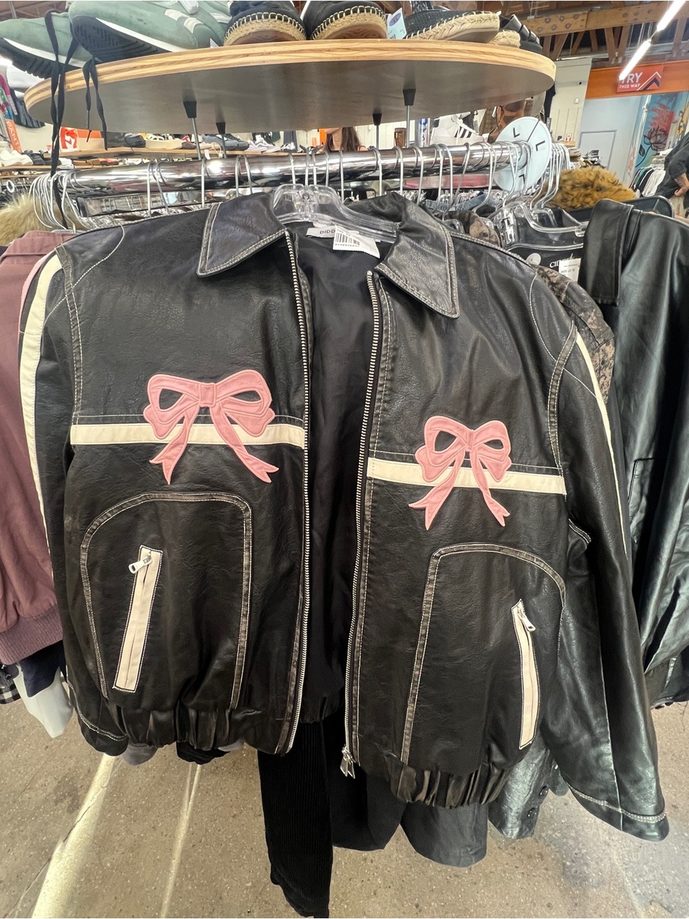 Black Faux Leather Bomber Jacket with Pink Bow Accents